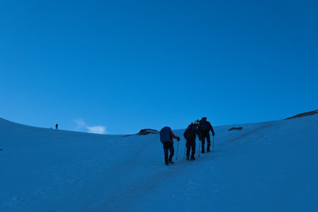 Hikers on the summit with breathtaking views